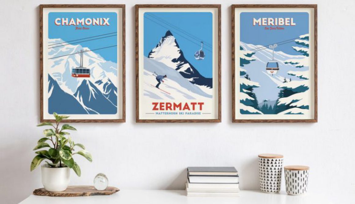 3 illustrations of ski resorts hanging on a wall