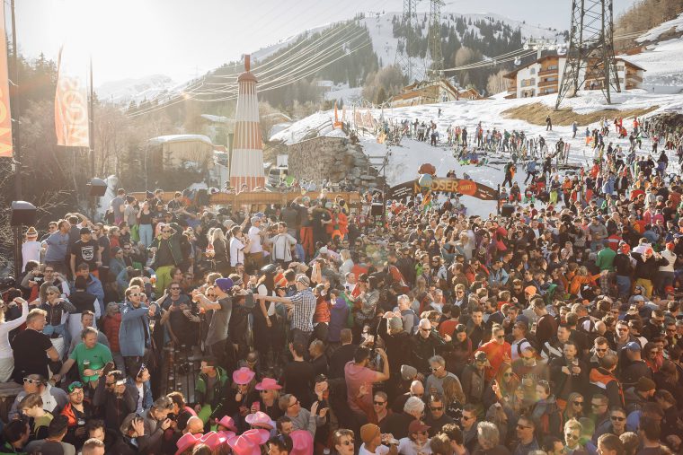 Large group of skiers partying on the terrace at Mooserwirt bar in St Anton.