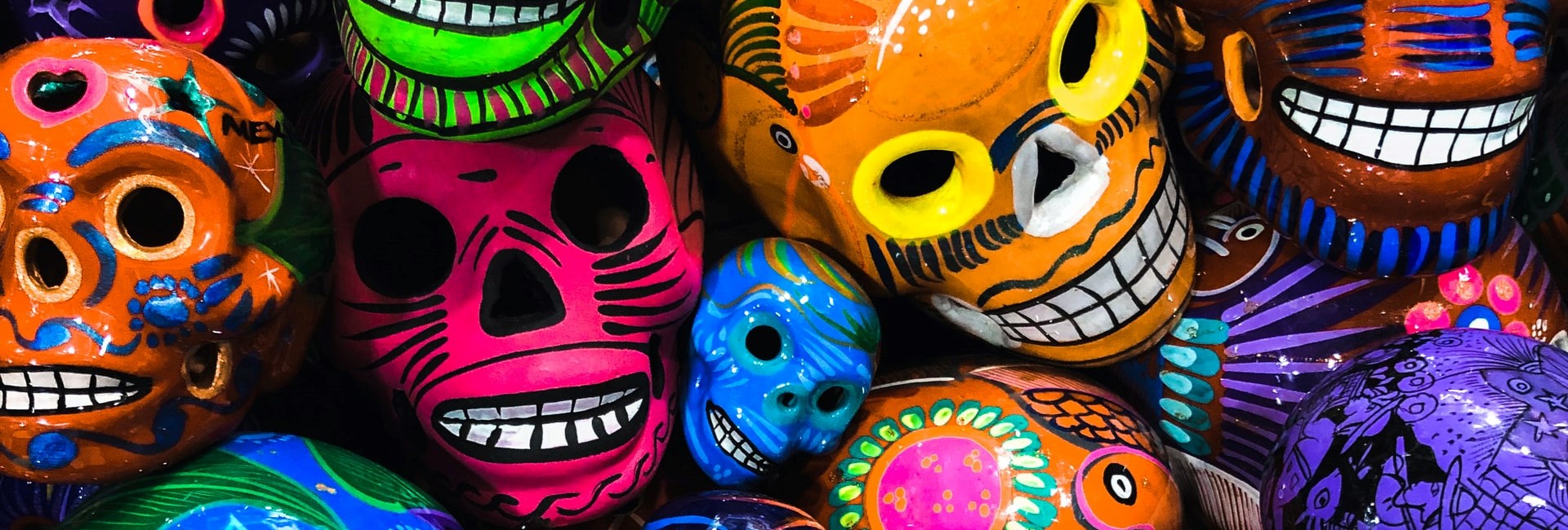 Close up of colourful Mexican skull ornaments