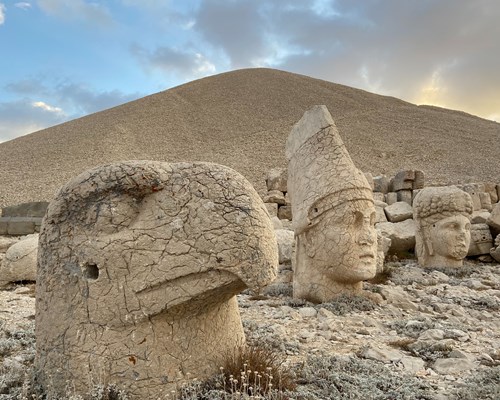 Stone Statue heads on rocky grounds