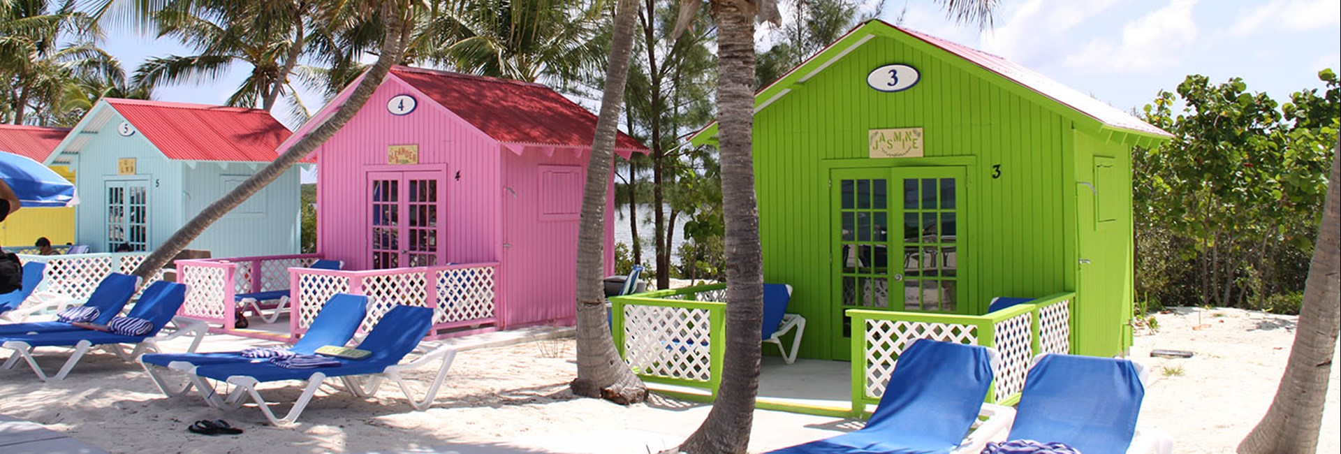 Colourful beach huts on the beach in the Bahamas