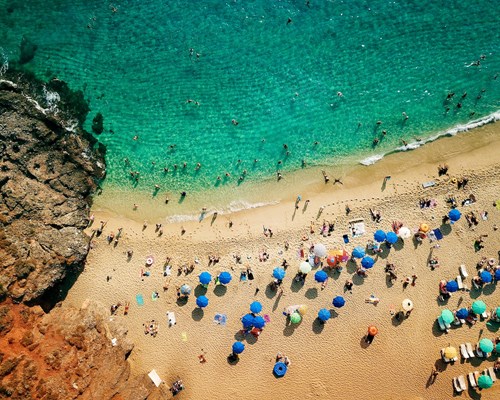 An aerial view of turquoise waters and Kleopatra Beach