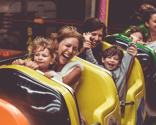 People enjoying a ride with kids 