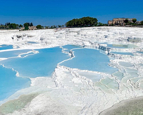 A picture of thermal pools with white terraces  
