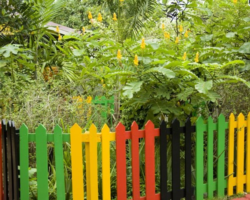 Colourful fence around a small garden