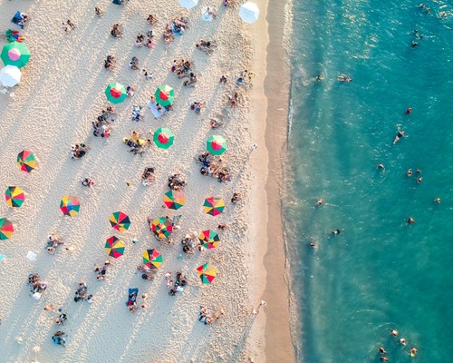 An aerial view of a beach with people