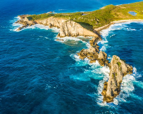Aerial view of rocky peninsula of a tropical island